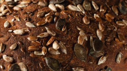 Close-up surface of homemade whole grain bread, food background, texture