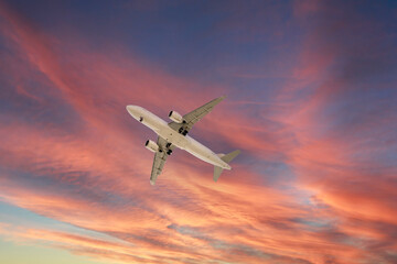 Fototapeta na wymiar Generic image of an airliner with sunset sky