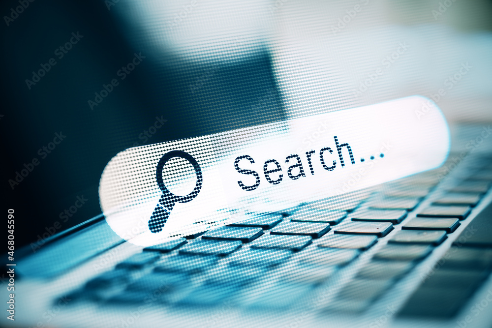 Poster close up of notebook with creative search bar on dark background. seo and internet concept. double e