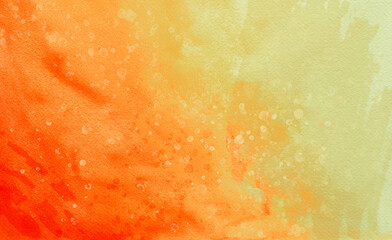 Colorful watercolor background texture, distressed paint spatter and grunge in bright orange red yellow and beige colors on watercolor paper texture, hot fiery vibrant colors