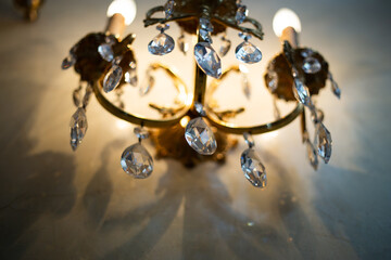 Expensive exquisite crystal chandelier in Victorian style indoor