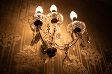 Expensive exquisite crystal chandelier in Victorian style indoor