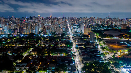 Obraz premium Aerial view of the Ibirapuera district at night. Avenida Paulista in the background. Selective focus