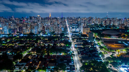 Aerial view of the Ibirapuera district at night. Avenida Paulista in the background. Selective focus