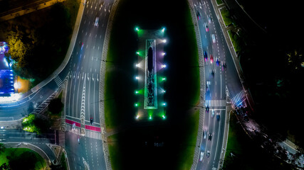 Monumento As Bandeiras in Ibirapuera Park in São Paulo, SP, Brazil.
Night aerial view. Hyperlapse. Selective focus