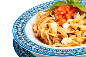 Spaghetti, tomato, cheese and basil