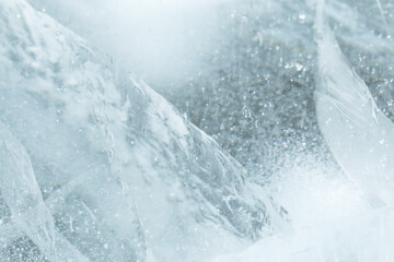 Beautiful ice of a frozen lake. Close-up.