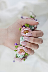 hand with wedding manicure