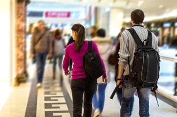 People Walking in Modern Shopping Mall