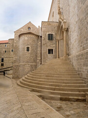 Round stone steps outside ancient buildings in Dubrovnik, Croatia.