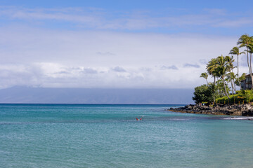 Tropical beach in Maui, Hawaii. Ocean water background 