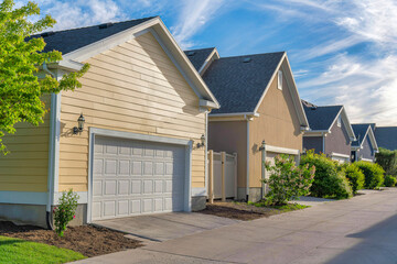 Attached garages at the back of the houses at Daybreak, Utah