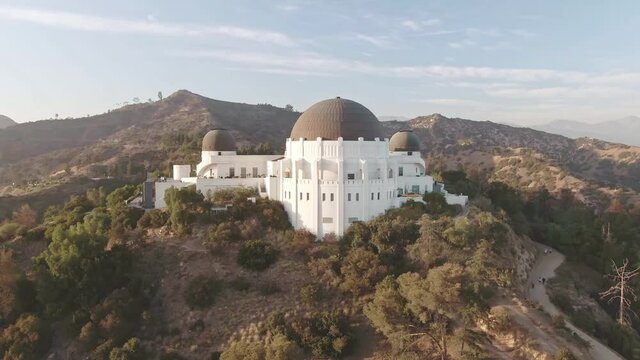 Aerial view of Griffith Park observatory. downtown Los Angeles skyline, drone 4k. California travel destination, popular tourist city in America.