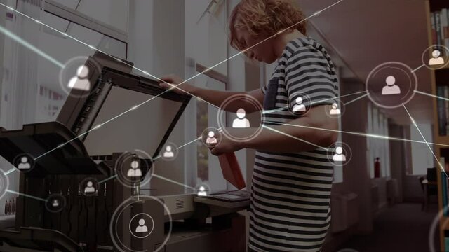Animation of network of connections over male student using copying machine