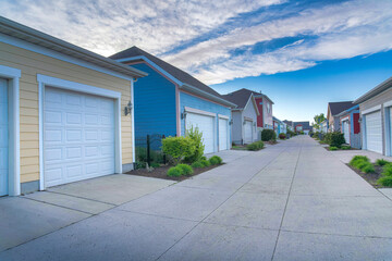 Exterior of garages across each other in a residential area at Daybreak, Utah