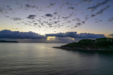 Aerial sunrise seascape with clouds