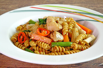 Drunken Fusilli with chicken, Thai style pasta. Thai Spicy Fusilli with chicken and herbs.