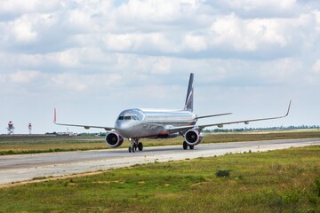 Fototapeta na wymiar Airlines Boeing passenger plane arrival and landing at Airport