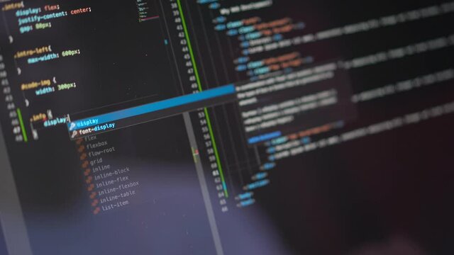 Work From Home Programmer Coding And Writing CSS In Visual Studio Code. close up