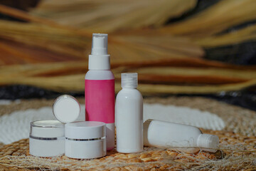 a package of bottles and packaging for women's serum lotion skincare