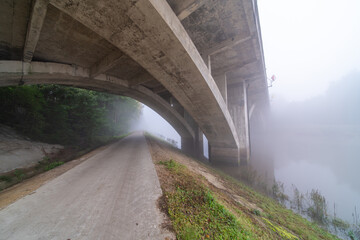 under the bridge with fog