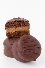 Whole and a half of honey cookies stuffed with dulce de leche.