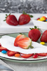 Sweet tapioca of condensed milk and strawberry, selective focus.