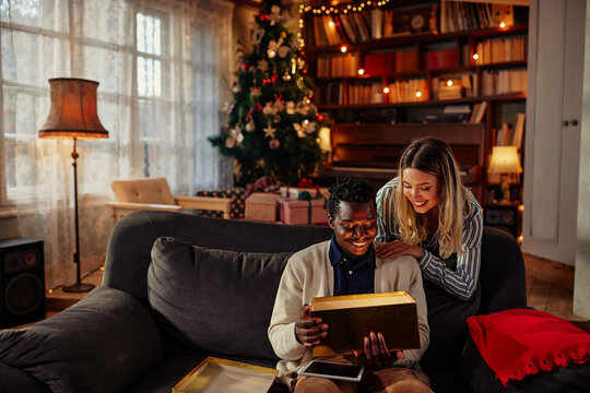Diverse couple in love celebrating Christmas
