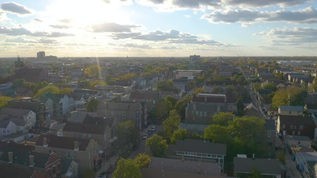 Aerial Establishing Shot of Urban Neighborhood on Autumn Afternoon. Pilsen, Chicago