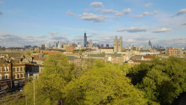 Drone Flying Away from Pilsen Neighborhood on Beautiful Fall Afternoon in Chicago, Illinois