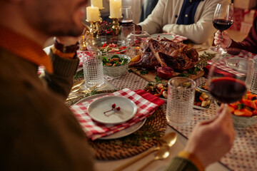 Close up of people sitting at the holiday dining table