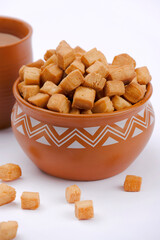 Shakkarpara or shankarpali or shankarpale is square shape Traditional homemade indian maharashtrian sweet snack food, prepared in diwali festival in india.