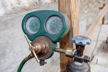 Acetylene welding torch valves and gages closeup