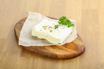 Greek Feta cheese over board