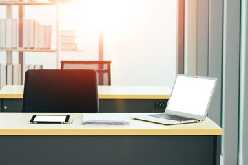 Laptop computer on desk blank screen mockup technology