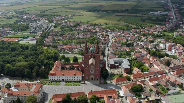 Aerial View Of The St. Peter Cathedral And The City Center Of Djakovo In Croatia - drone shot