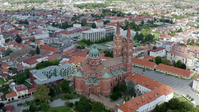 The Largest Sacral Building In Slavonia. Dakovo Cathedral Dedicated to St. Peter In Croatia, City Center Of Dakovo. Aerial Drone