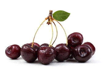 Wet dark red cherriies