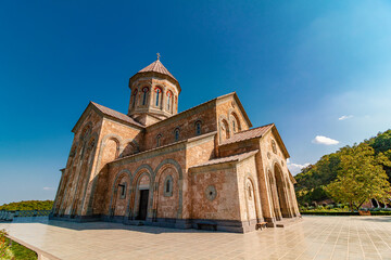 Fototapeta na wymiar Bodbe's St. Nino's Convent Cathedral at summer. Ultra wide shot