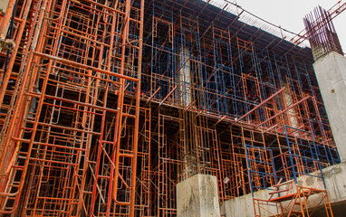 Concrete formwork and scaffolding on construction site