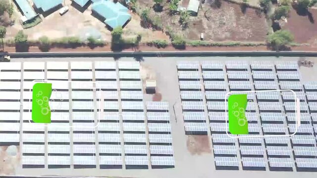 Alternative energy  wind mill and solar panel green energy production. Solar panel produces green, environmentally friendly energy from sun. Landscape solar plant that is located inside a valley