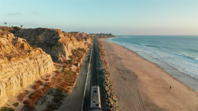 Aerial view of an Amtrak train passing under in San Clemente California