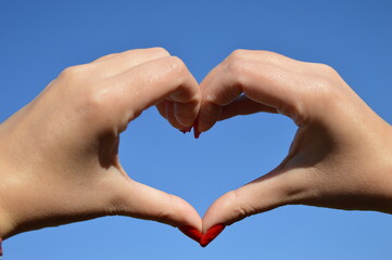 heart shaped woman hands