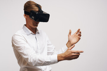 portrait of a man in a white shirt vr glasses gadget device video technology studio