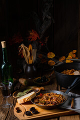 Polish bigos cooked according to an old recipe with wine and plum