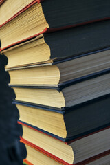 Stack of battered old books.Retro library and books.