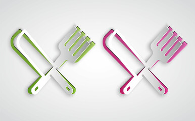 Paper cut Crossed knife and fork icon isolated on grey background. Cutlery symbol. Paper art style. Vector