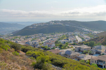 San Marcos residences in between the mountain slopes at Double Peak Park in California