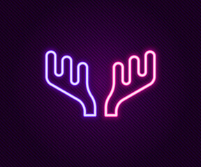 Glowing neon line Deer antlers icon isolated on black background. Hunting trophy on wall. Colorful outline concept. Vector