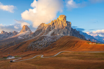 Famous Passo di Giau, Monte Gusela at behind Nuvolau gruppe the Dolomites mountains, near the famous Cortina d’Ampezzo city at sunset in South Tyrol - 468111789